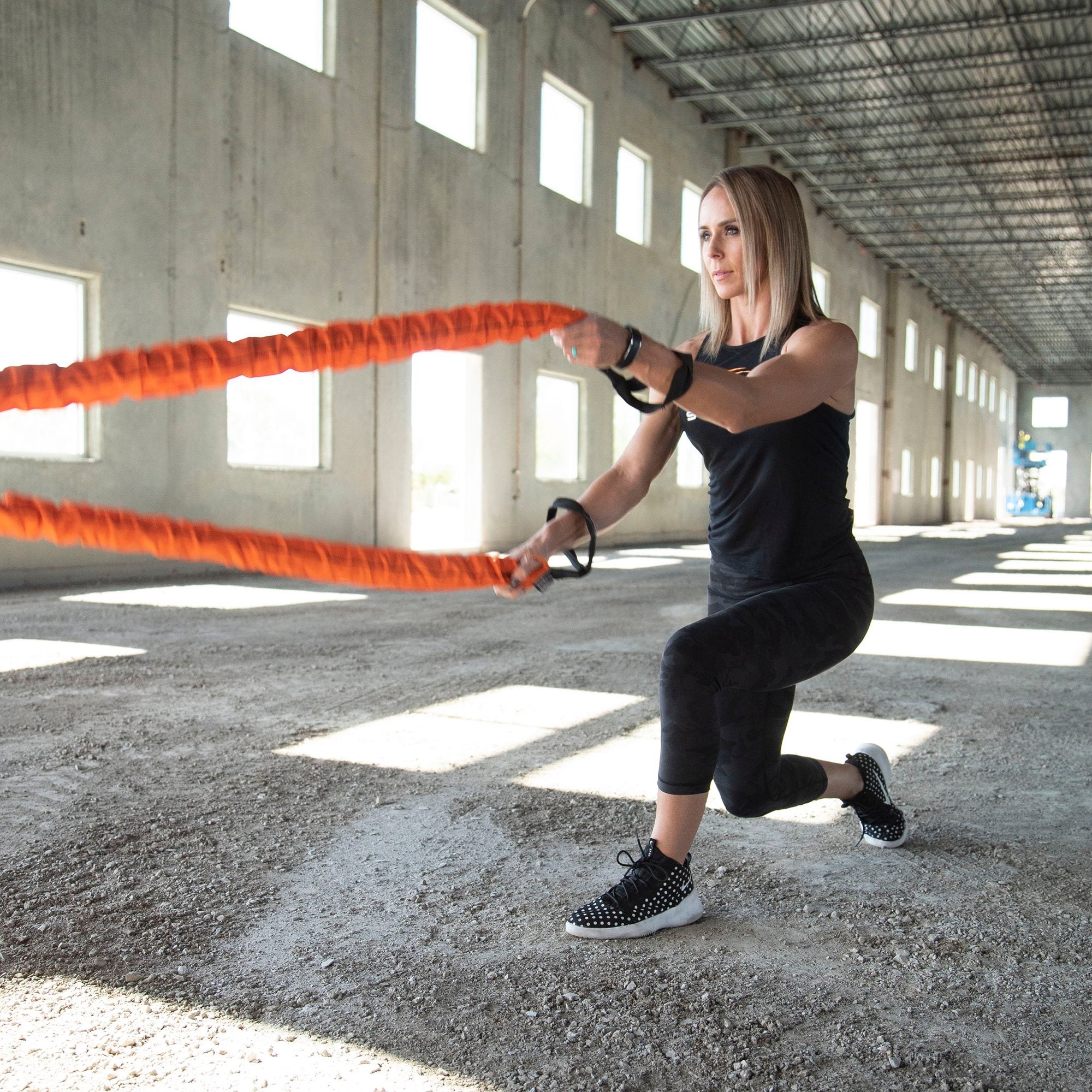 woman using Stroops Beast Battle Rope